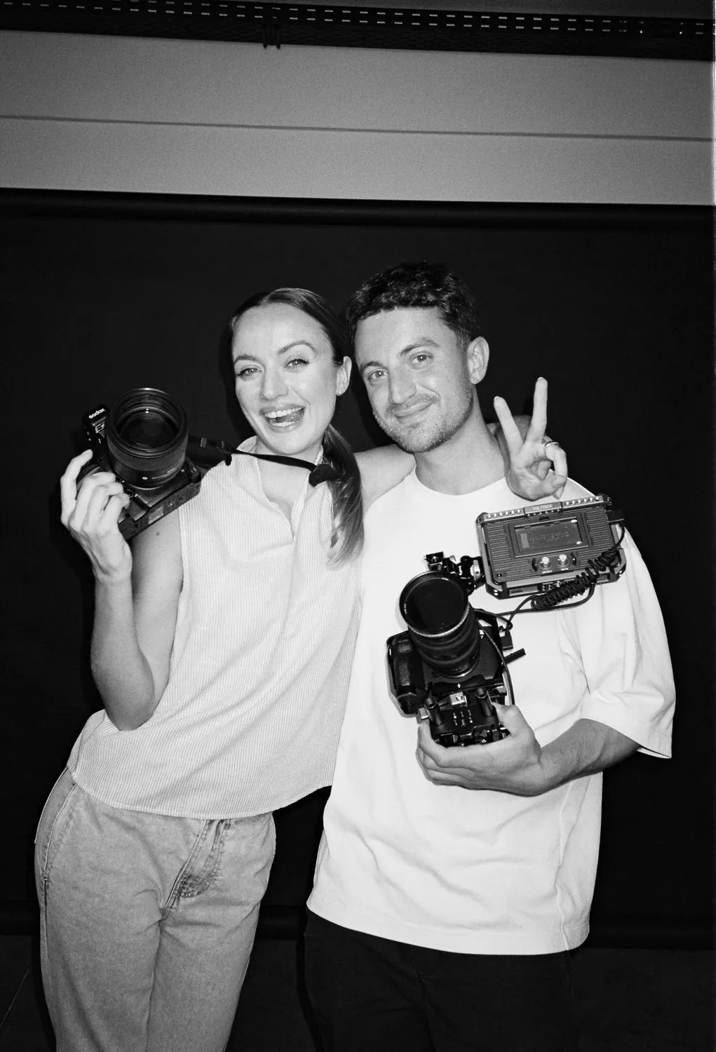 Elisabeth and Manos Aronis with their cameras